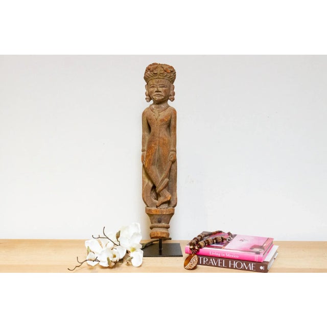 An antique Indian Gujarati wooden architectural bracket. Imagine it as part of a majestic palace in 19th century Gujarat,...