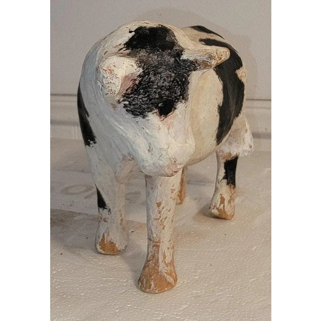 20Thc Paper mache original painted and hand crafted cow.The condition is very good.