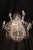 Large Swedish ceiling chandelier in classicist style. Solid, silvered brass. Hangings from finely ground crystal....