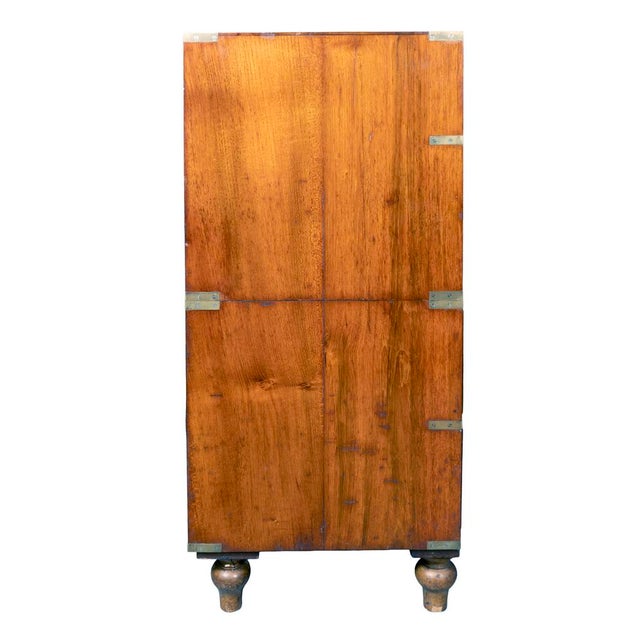 Victorian mahogany campaign chest. Two drawers over three long drawers. Toupie feet. Brass corner details and original...