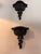 Pair of mid-century, Hollywood Regency style wall-mounted shelves featuring intricate detailing throughout. Trompe l’Oeil,...