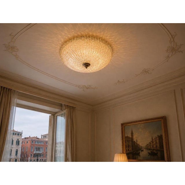Magnificent murano-inspired ceiling light from the 1990s, crafted with transparent glass elements enriched with gold leaf...