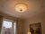 Magnificent murano-inspired ceiling light from the 1990s, crafted with transparent glass elements enriched with gold leaf...