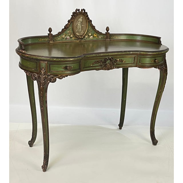 Italian Venetian-style kidney-shaped writing desk or vanity, featuring a wonderfully distressed original sage green finish...