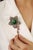 This bold 24.3 carat ruby, sapphire, emerald, and diamond floral brooch pendant is crafted in 925 sterling silver....