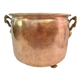 Early 20th Century Hammered Copper Jardinere With Brass Rams Head Handles and Lion Paw Feet For Sale