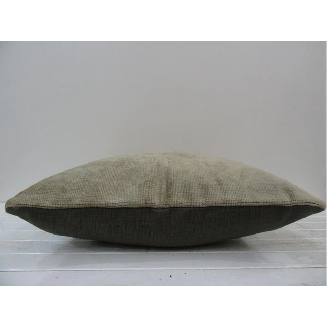 This is a pillow cover made from a vintage kilim rug. The piece was properly washed and ready to use. Pillow inserts not...