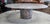 This exotic marble dining table showcases a breathtaking array of natural veining, seamlessly blending rich earthy tones,...