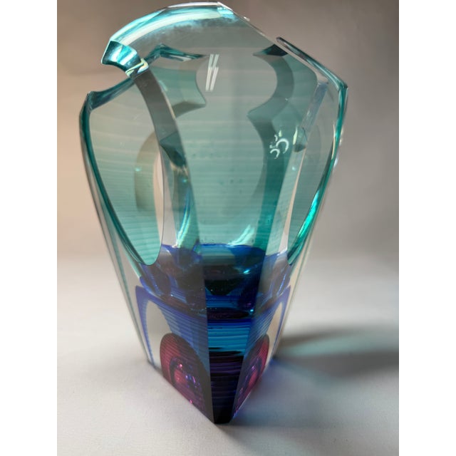 A striking signed studio art glass sculpture by American glass artists Michael David and Kit Karbler. The piece features a...