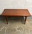 A wonderful example of high end Danish mid century furniture, this dining table designed by Johannes Andersen for Uldum...