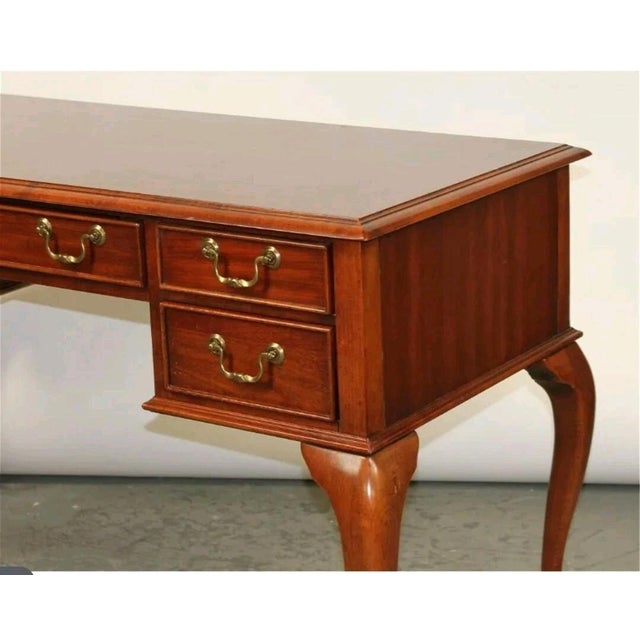 Description Queen Anne mahogany writing desk on pad feet 30"h x 50 3/4"w x 22"d Condition: scratches scuff.nick, good...