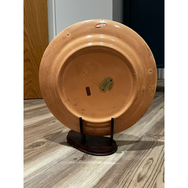 Decorative folk art plate by Continental Studios of Hollywood (also known as Coppercraft of Hollywood), which produced...