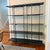 Four Hands Vito Bookshelf Modern industrial design gets softened by fine lines. Wide planks of distressed iron offer...