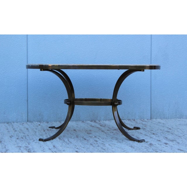 Stunning 1960s modern steel with bronze finish and travertine top coffee table from Spain. Matching side table also...