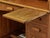 Completely restored American desk with a lockable top. Solid oak desk from the early 20th century with a practical roller...