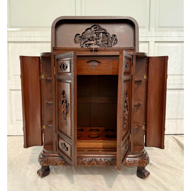 This is a beautiful vintage George Zee dry bar cabinet, dating to the mid-20th century, circa 1950s–1960s. Crafted in...