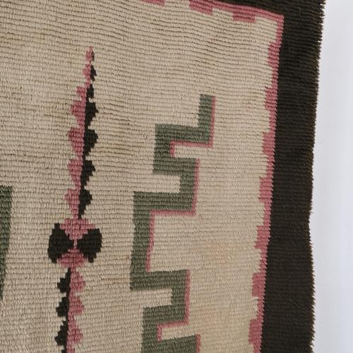 Handwoven Swedish rya rug showcasing a strong Art Deco geometric pattern in cream, brown, rose, and green tones. A...