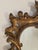 A classic George III Chippendale design hand-carved giltwood mirror made in England around 1920.