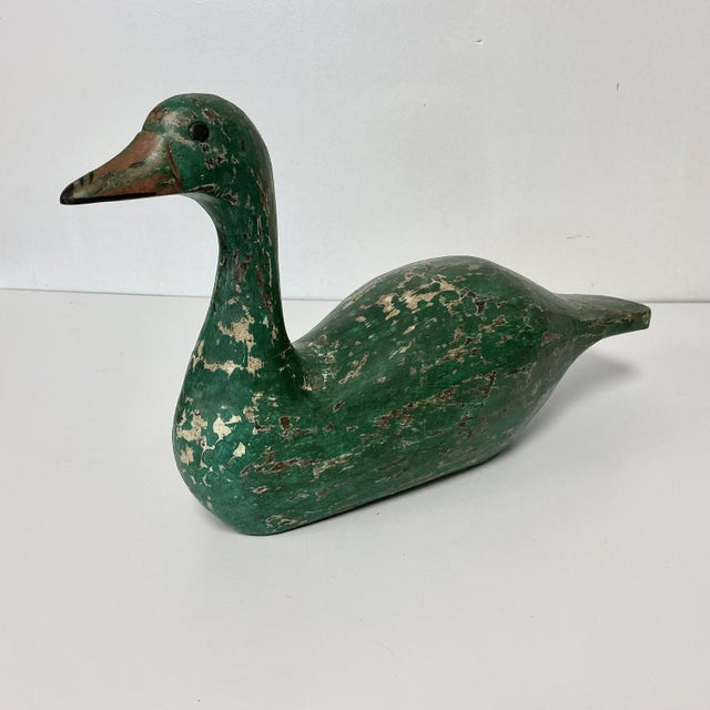 This 1970s hand carved wood duck is the perfect fall accent piece. It features an Arts & Crafts Farmhouse style that is...
