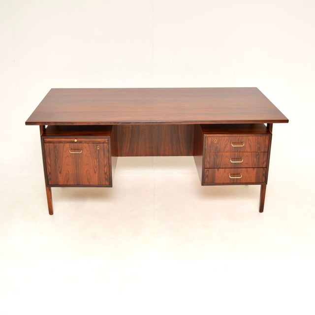 A stunning Danish vintage midcentury desk of the highest order. This was recently imported from Denmark, it dates from the...