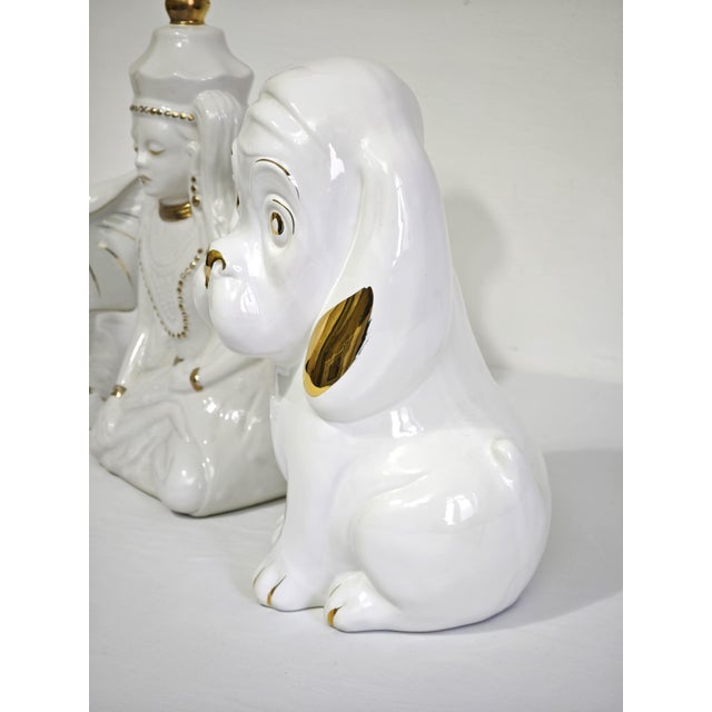Set of 3 white ceramic home decor items with gold details, typical of vintage Italian style. The set includes 1 table lamp...
