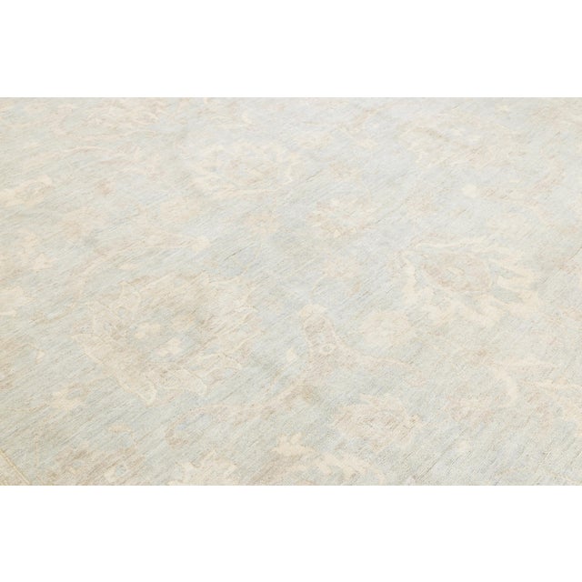 Hand-Knotted Modern Peshawar Wool Rug – Muted Light Blue & Cream Floral Design For Sale - Image 10 of 11