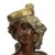 A pair of 19th-century Art Nouveau bronze decorative bases titled “Carmen” and “Mignon” in raised lettering. Each cast...
