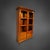 A two-door Biedermeier display cabinet in cherrywood. The cabinet's design is simple, crowned by a projecting cornice with...