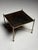 Side table/coffee table. Originally from France, mid-20th century. In the style of Maison Bagues. Top inlaid with leather...