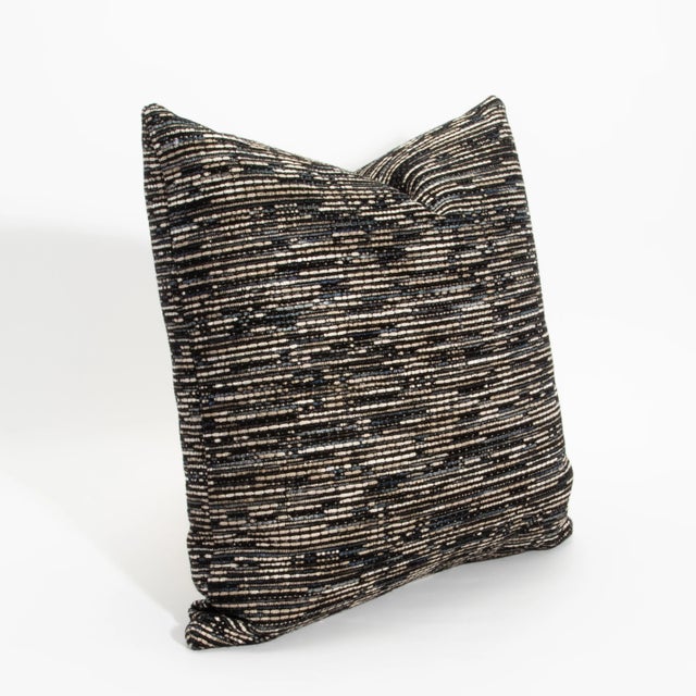 The Elitis Dark Woven Pillow by MOGUL, measuring 22x22 inches, is a true testament to luxury and refined craftsmanship,...