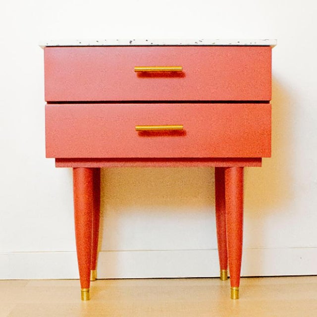 Mid-century nightstands from the 1960s, restored and refinished in pink colour. The tops of the nightstands have been...