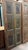 Elevate your space with this exquisite hand-carved floral wood barn door, a stunning architectural statement crafted from...