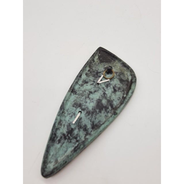 An original mid-century modern wall thermometer, made in western europe in the 1960s–70s. a distinctive, organic shape...