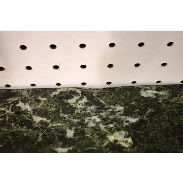 This exceptional French Art Deco console table, attributed to Edgar Brandt, captures the masterful synthesis of metalwork...