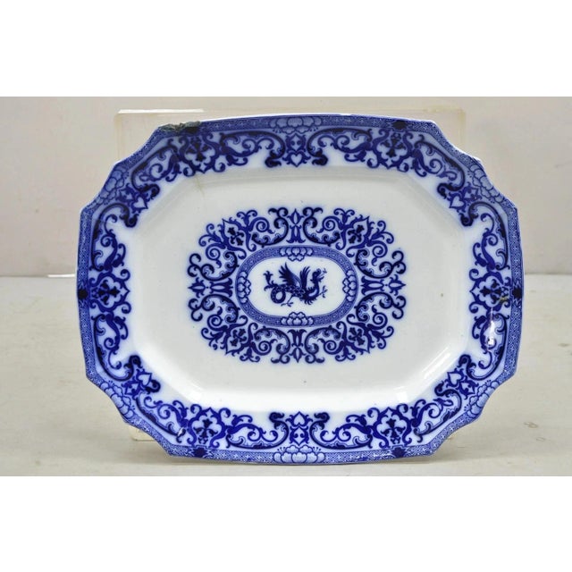 Antique Flow Blue and White Transferware Ironstone Platter Dish w Chinese Dragon. Circa Late 19th Century. Measurements:...