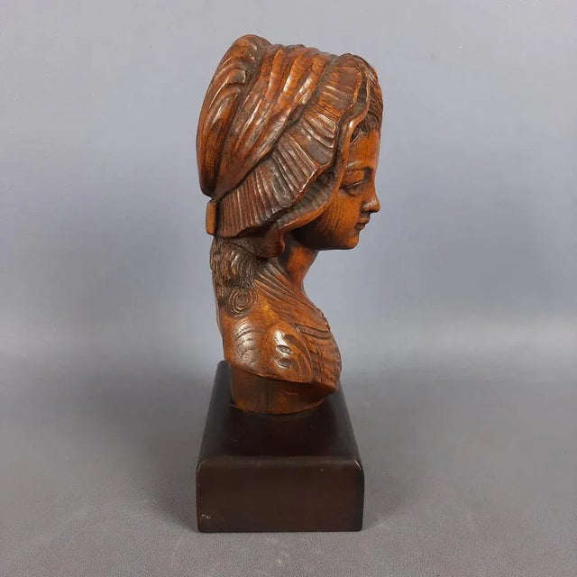 Beautiful vintage collectible sculpture, depicting a young girl's bust with a vintage veil, handcrafted in carved wood....