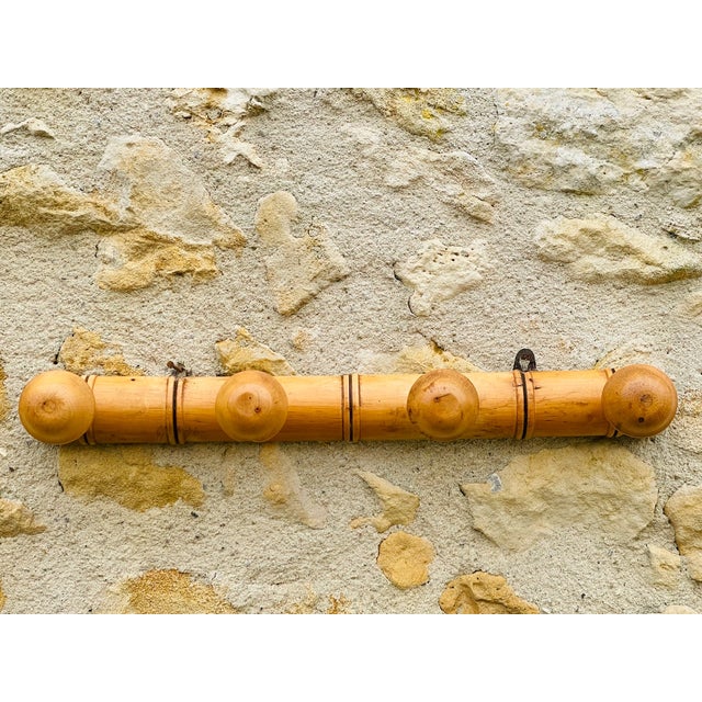 Mid-century, vintage, wall mount coat rack from the 50's - 60's. This coat rack from France, is made of turned wood,...