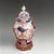 A highly decorative early 18th-century Japanese Arita porcelain baluster vase with its cover and a later stand,...