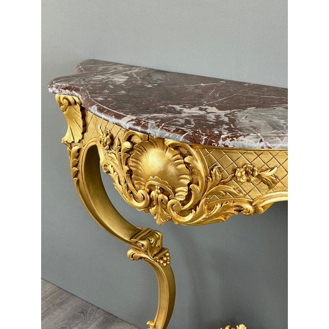 Louis xv style wall console in gilt wood and marble – 19th century a superb louis xv style wall console, crafted from...