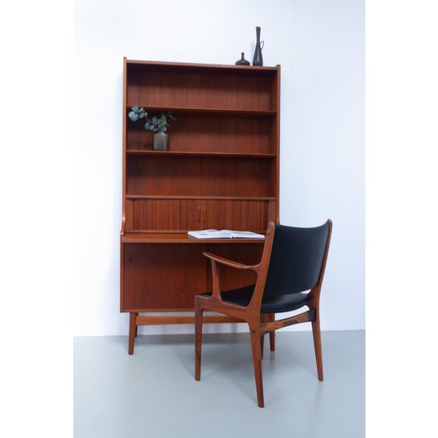 Iconic Danish Rosewood Armchair by Johannes Andersen for Uldum Møbelfabrik, 1960s. Elegant and beautiful Scandinavian Mid-...