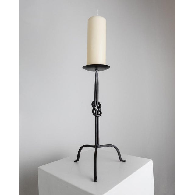 This vintage candleholder made of hand-forged iron in a brutalist design dates back to the 1970s in Italy. The striking...