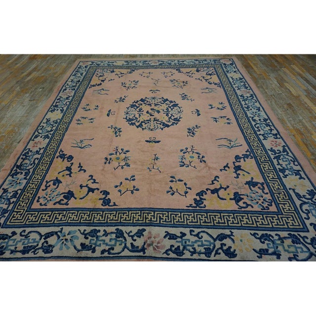 Antique Chinese - Peking Coral 1930s Rug, Circa Date: 1930s. This exquisite example of early 20th-century Chinese weaving...