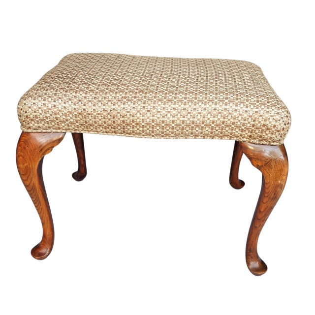 Vintage Carved Oak Armchair & Matching Ottoman Set. Bring a touch of classic sophistication to your home with this...