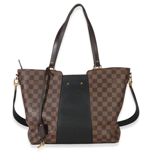 Item #: 154965 Interior Material: Microfiber Dimensions: 12 x 10 x 5.5 in Features Interior: Three slip pockets Strap...