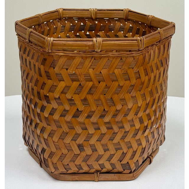 Vintage angular woven wicker basket framed in solid bamboo with striking herringbone pattern to frame. Top and bottom...