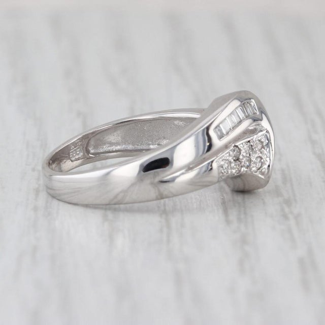 Gemstone Information: - Natural Diamonds - Total Carats - 0.10ctw Cut - Round Brilliant Color - F - H Clarity - I1 -...