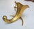 Brass tripod bouquet holder, aka as a "tussie-mussie" holder, featuring a cornucopia or horn of plenty design. A brass-...