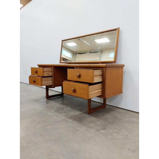 Authentic vintage mid century modern teak dressing table / vanity / desk with mirror. This piece is in excellent condition...