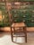 Solid antique piece with character: - Woven reed seat - Ladderback