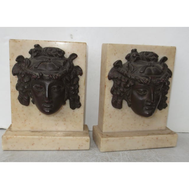 Vintage British Museum Bookends by Alva Stone Replica. Neo-classical revival.The sculptural face of a Dionysus is center-...